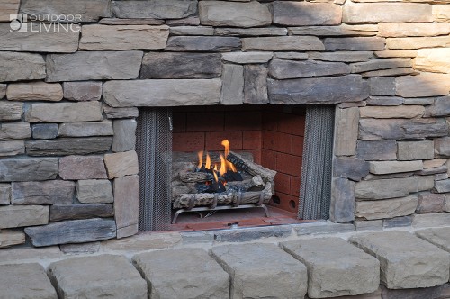 Burning wood in a fireplace