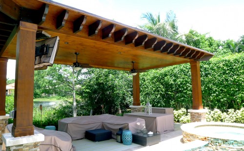 A large Pergola with only 4 columns and lots of wood features
