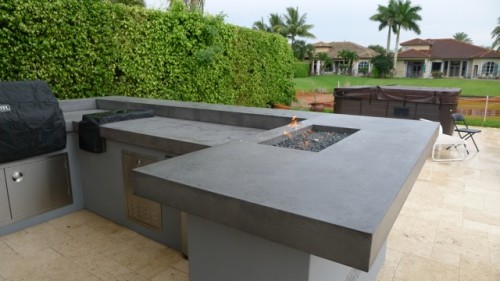 Firepits built into Concrete Counter tops in Outdoor Kitchens