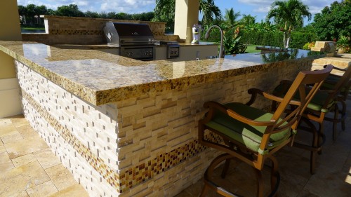 Beautiful Outdoor kitchen with an artistic countertop