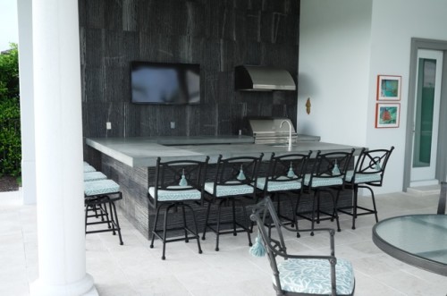 Outdoor kitchen with a concrete counter top