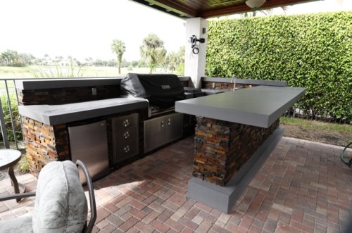 Beautiful artistic countertop on Outdoor kitchen and an extra large full bar