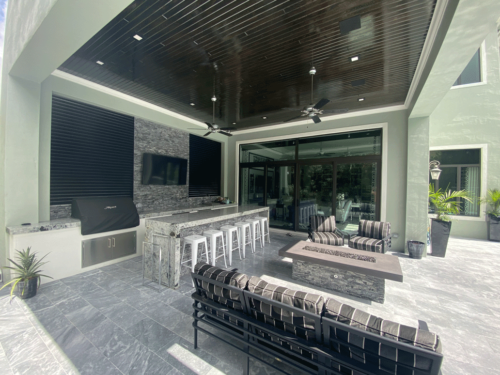 cabanas with a granite countertop and a custom fire place